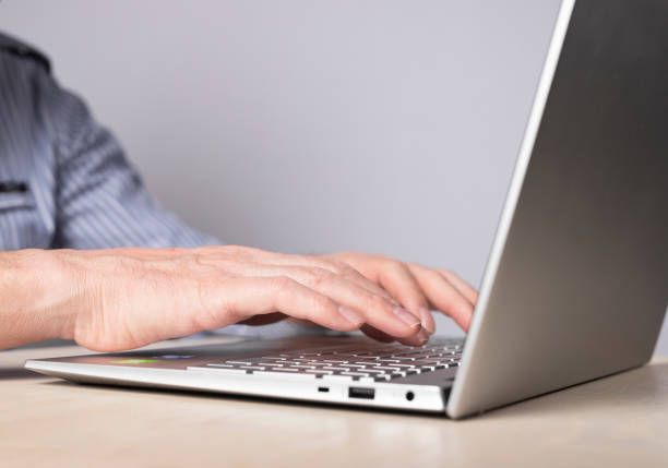 istock Man hands closeup typing on laptop keyboard. Using computer in common life, education, work, rest, social communication and shopping. 1389095035