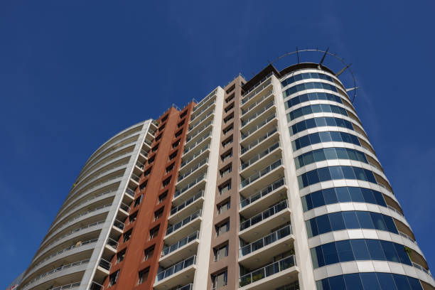 istock Part of a city building with blue sky 1389096550