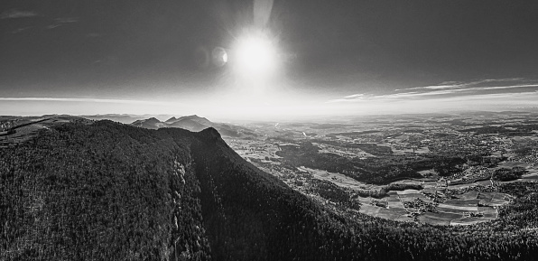 Photo in black and white with a view of the Röti mountain in the Jura mountains and the city of Solothurn and its surroundings.