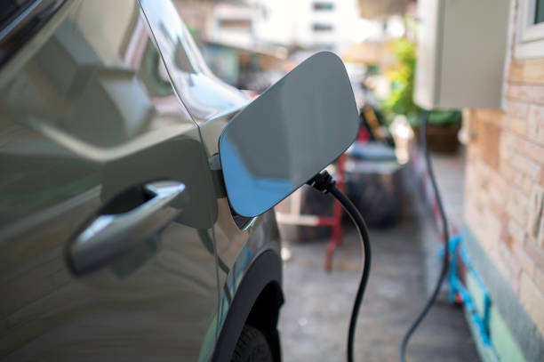 istock Electric cars charging 1389099348