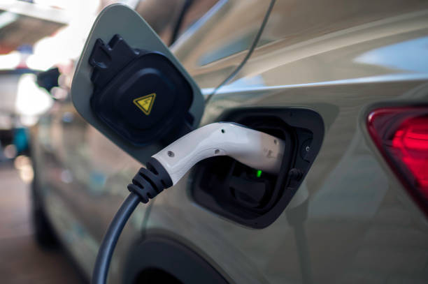 istock Electric cars charging 1389099351