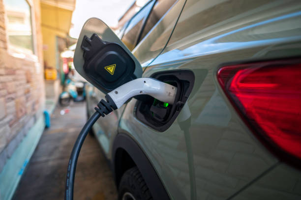 istock Electric cars charging 1389099369