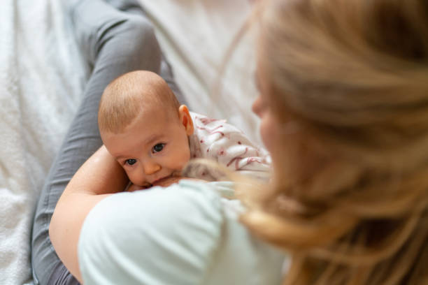 istock Mother breastfeeding her baby 1389100060