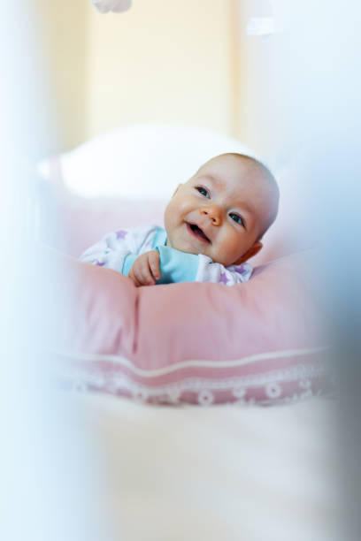 istock Baby girl at home 1389100083