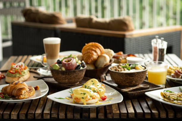 istock Western big gourmet breakfast selection mixed dishes on restaurant table 1389102808