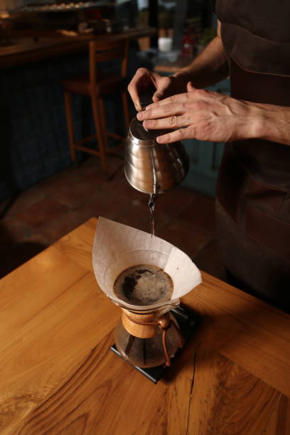 istock barista brewing coffee in the coffee room 1389105346