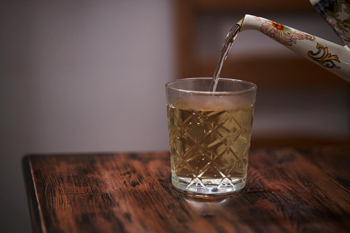 glass of tea on dining table