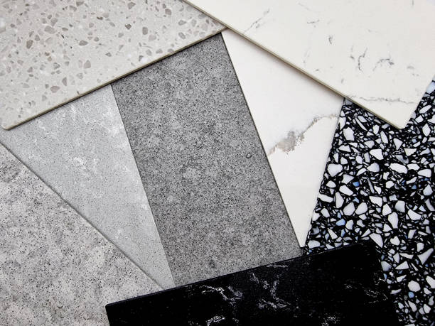 istock close up view of different quartz samples textures for kitchen counter top. various colors and textures of artificial stones including marble, pebbles, grainy surface. random placed. 1389116322