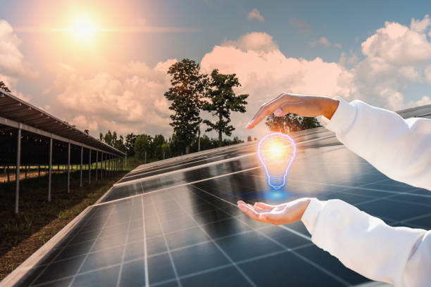 istock Corporate manager presenting on how to sell electricity from rooftop solar back to the grid. Industry and technology concept for energy producer-consumer, power generation, virtual power plant. 1389122977