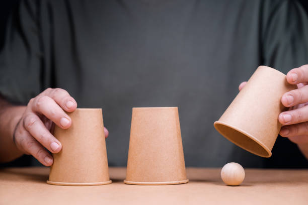 Play the shell game with a wood ball
