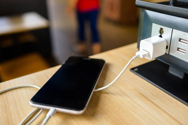 istock Phone during charging in the cafe 1389124924