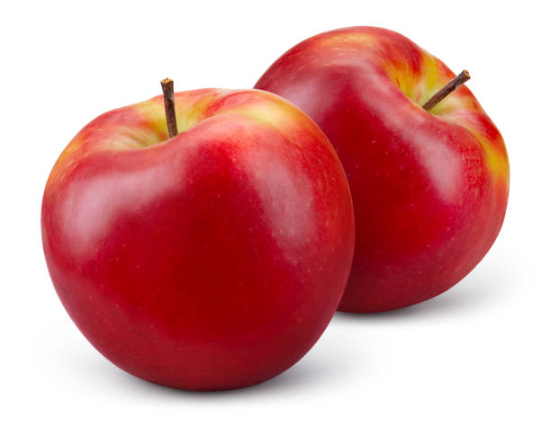 istock Apple on white background. Two red apples with yellow side isolated. Red appl with clipping path. Full depth of field. 1389127252