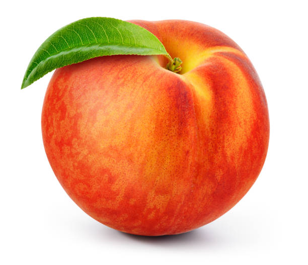 istock Peach isolated. Peach with leaf on white background with clipping path. Full depth of field. 1389129387