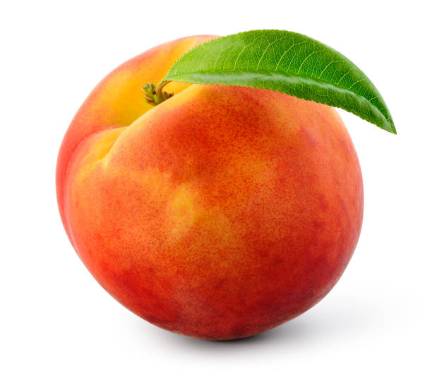 istock Peach isolated. Peach with leaf on white background with clipping path. Full depth of field. 1389129402