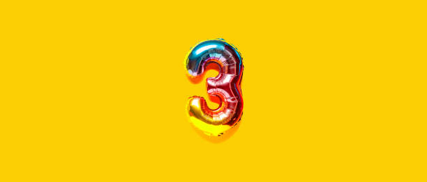istock Rainbow foil balloon number. Top view. 1389130648