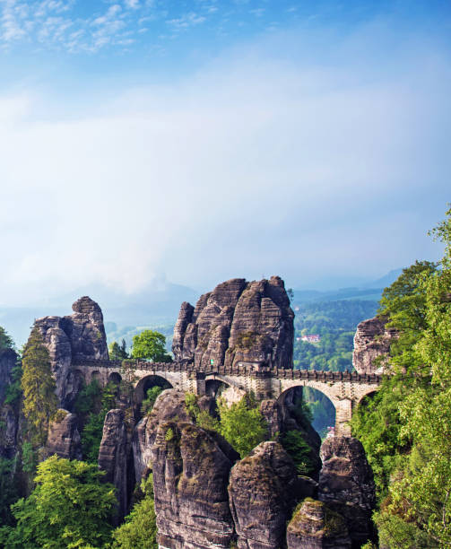 istock Bridge between rocks near Rathen, Germany, Europe (Sachsische Schweiz) 1389135861
