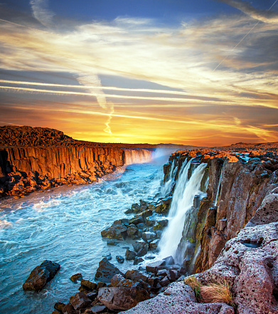 Charming magical view with famous waterfall Selfoss in Iceland at sunrise. Exotic countries. Amazing places. (Meditation, antistress - concept).