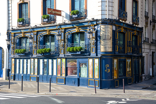 Paris, France - March 11, 2024. Building facade and terrace at \