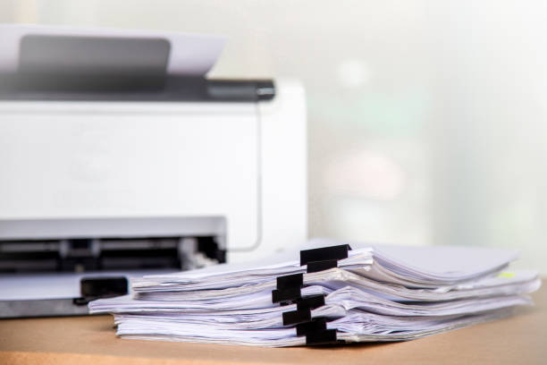 istock Printer, copier, scanner in office. Workplace ,photocopier machine for scanning document printing a sheet paper and xerox photocopy. 1389142182