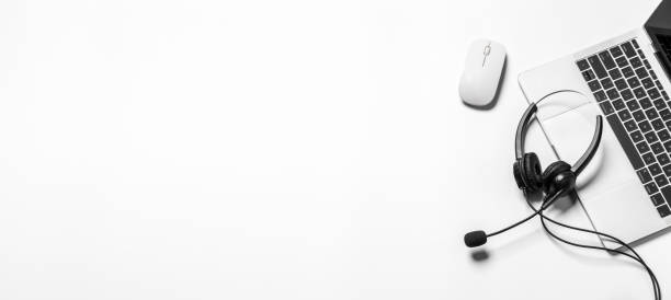 istock Headset and customer support equipment at call center ready for actively service , Communication support, call center and customer service help desk.for (call center) concept . 1389142239