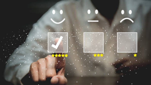 istock Businessman pressing smiley face emoticon on virtual touch screen. Customer service evaluation   Service rating, satisfaction  concept. 1389142268