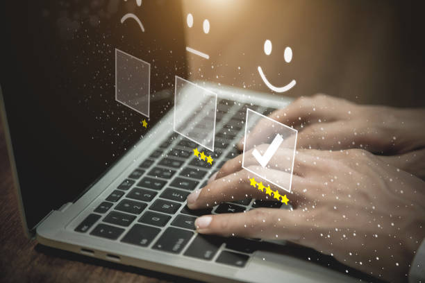 istock Businessman pressing smiley face emoticon on virtual touch screen. Customer service evaluation   Service rating, satisfaction  concept. 1389142272