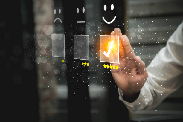 istock Businessman pressing smiley face emoticon on virtual touch screen. Customer service evaluation   Service rating, satisfaction  concept. 1389142274
