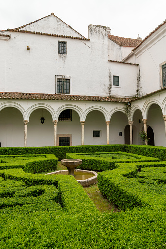 Vila Vicosa, Portugal - 25 March, 2022: the gardens and portico patios in the courtyard of the Ducal Palace of the House of Braganza