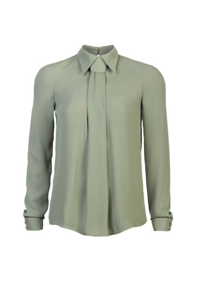 istock Women's summer silk green blouse isolated on white background. 1389147439