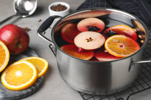 istock Delicious mulled wine and ingredients on grey table, closeup 1389149705
