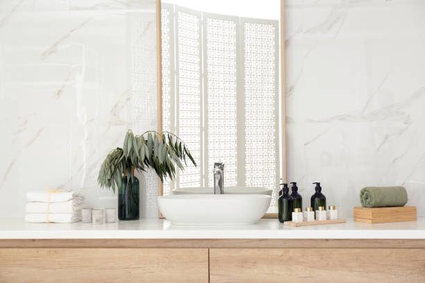 istock Modern bathroom interior with stylish mirror and vessel sink 1389150114