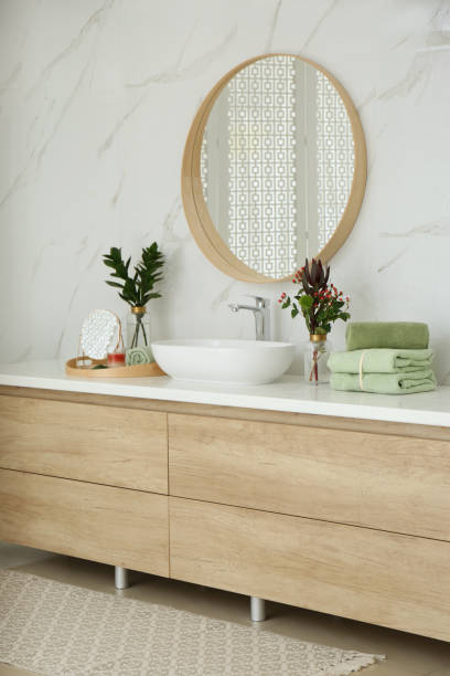 istock Modern bathroom interior with stylish mirror and vessel sink 1389150118