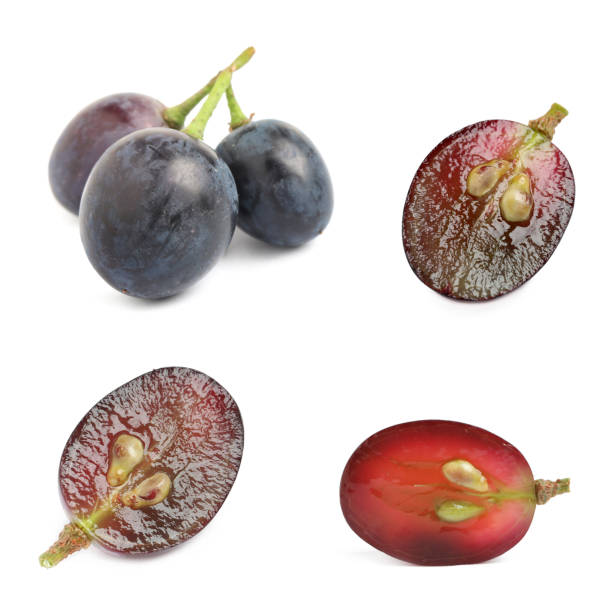 istock Set of cut and whole grapes on white background 1389150267