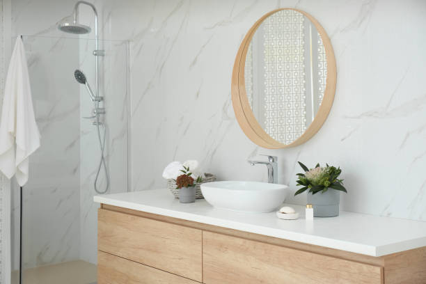 istock Modern bathroom interior with stylish mirror and vessel sink 1389151170