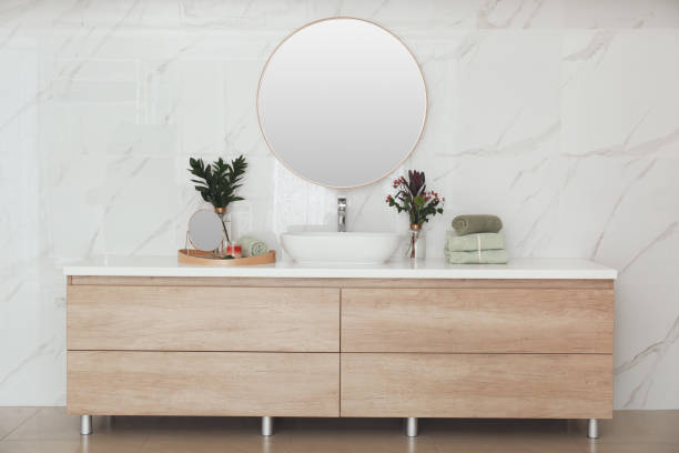 istock Modern bathroom interior with stylish mirror and vessel sink 1389151476