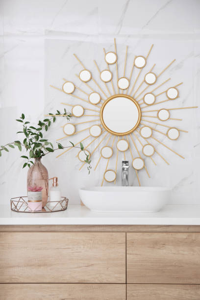 istock Modern bathroom interior with stylish mirror and vessel sink 1389151834
