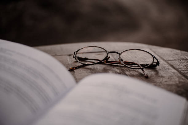 istock Minus glasses and books 1389154812