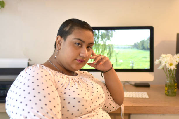 istock young woman at her work desk 1389157014