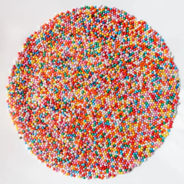 Photo of Background abstract texture colorful sprinkles sugar candy
