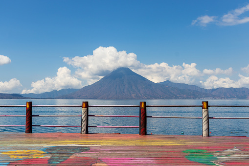 panajachel, solola, Guatemala; 03-28-2022: lake atitlan colorful  wooden deck viewpoint