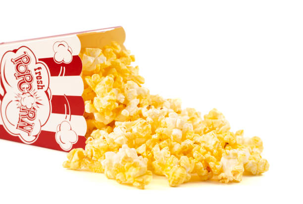 Red and White Striped Popcorn Container with Butter Popcorn Red and White Striped Popcorn Container with Yellow Butter Popcorn popcorn snack bowl isolated stock pictures, royalty-free photos & images