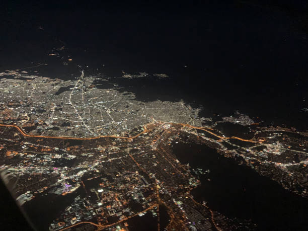 istock Flying over a city at night 1389162923