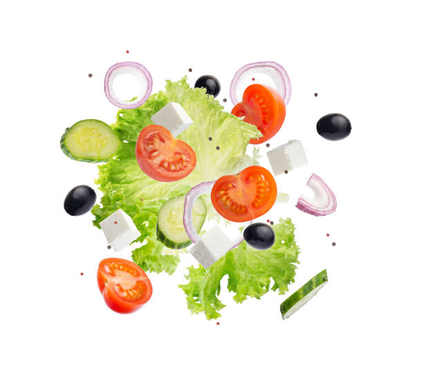istock levitating salad ingredients on white isolated background 1389166945