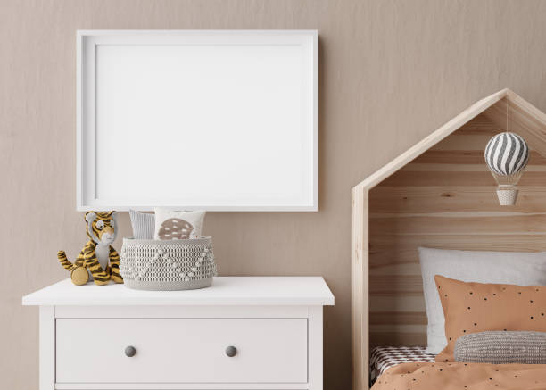 istock Empty horizontal picture frame on brown wall in modern child room. Mock up interior in scandinavian style. Free, copy space for your picture, poster. Close up view. Cozy room for kids. 3D rendering. 1389167512