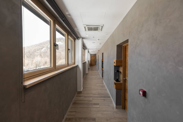 Long narrow hallway in luxurious hotel on a mountain.