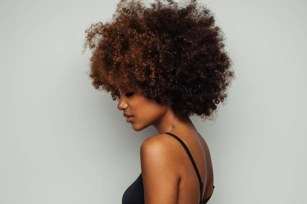 istock Beautiful afro woman with perfect make-up 1389174972