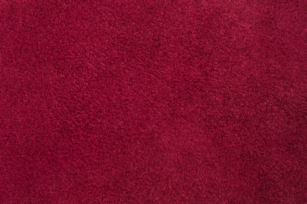 istock Burgundy suede, natural leather, texture, background. 1389176097