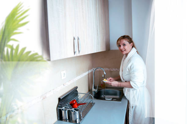 istock Tidying up the Kitchen 1389177262
