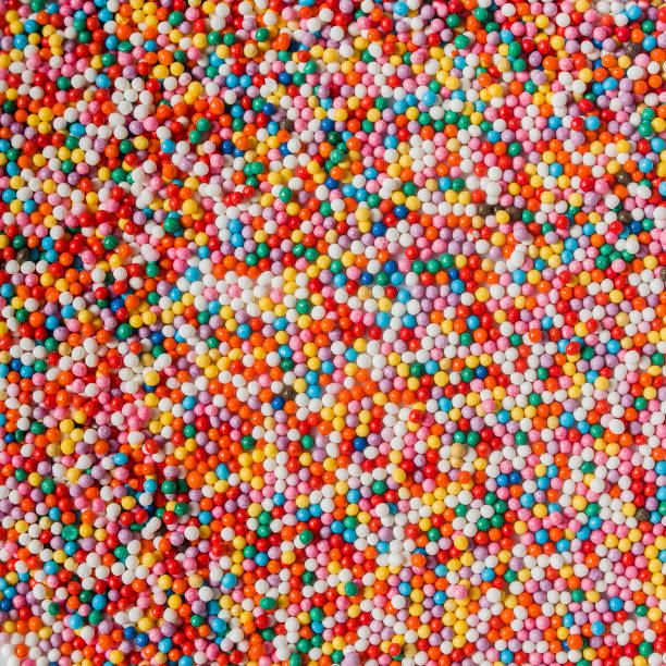 istock Background abstract texture colorful sprinkles sugar candy 1389178448
