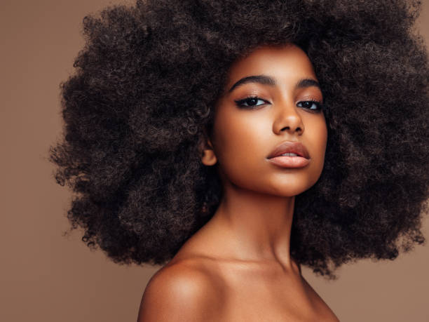 istock Beautiful girl with curly hairstyle 1389179965